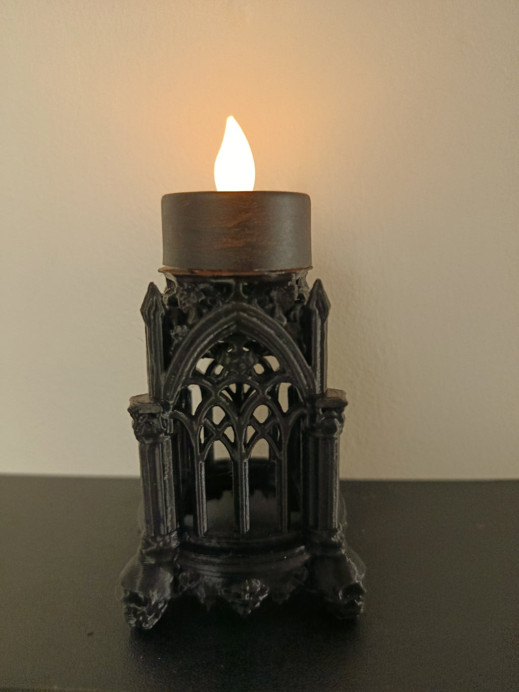 Gothic Pillar Lantern with a cadnle on top